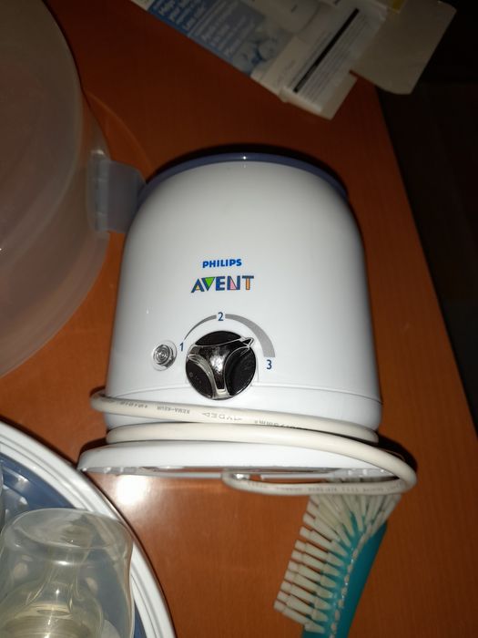 Conjunto biberões, aquecedor e esterilizador