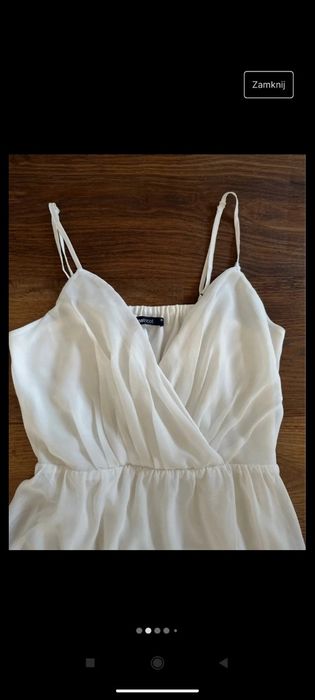 Elegancka biała midi sukienka