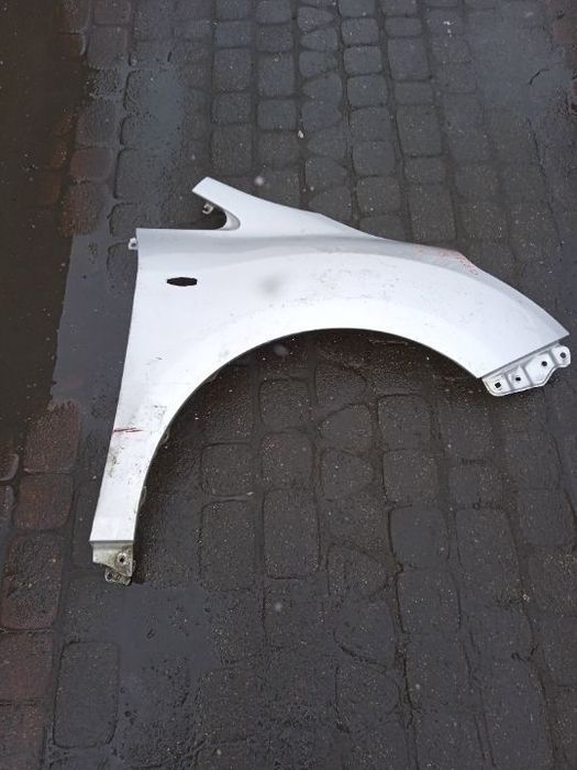 BŁOTNIK TOYOTA COROLLA VERSO 09-13 PRAWY