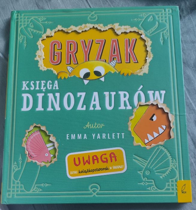 Gryzak księga dinozaurów JAK NOWA