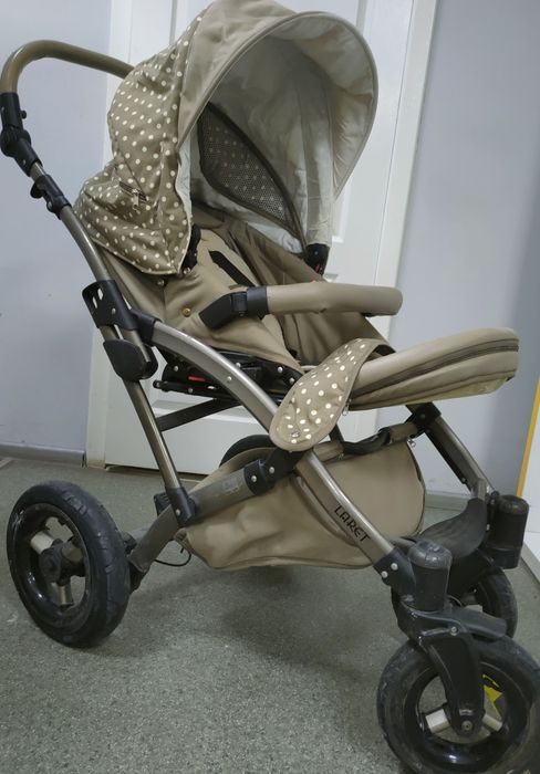 Продам коляску Laret 2 в 1 (зима-лето) бежевая в белый горошек.