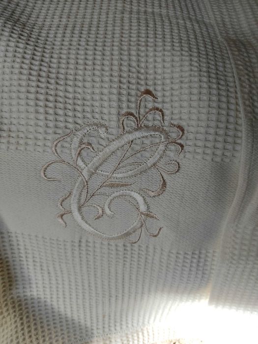 Toalhas decorativas com monogramas "C" e "M"