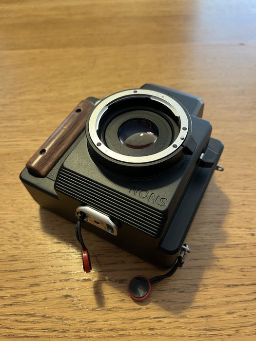 Nons SL660 (instax), mocowanie EF, obiektywy 50/1.8 oraz 35/2.4