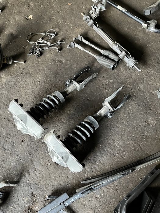 Audi Q7 usa 2015-15 стойка амортизатора с опорой передняя