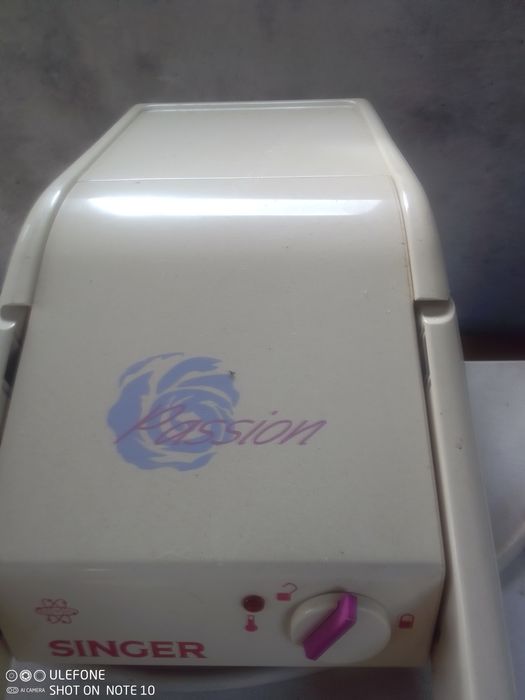 Maquina manual de passar a ferro SINGER