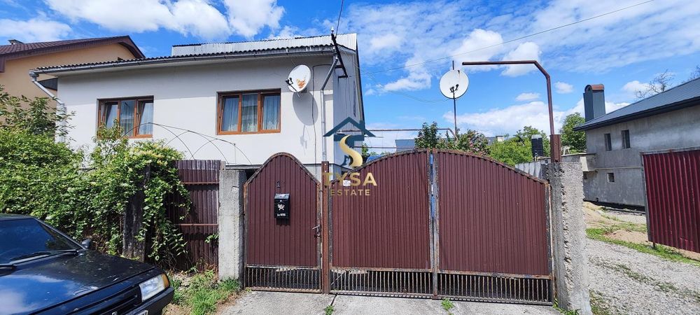 Великий будинок у Тячеві: 210 м², 7 соток, гараж та всі комунікації