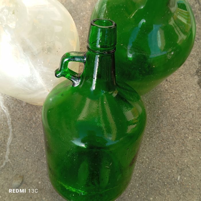 9 garrafões em vidro