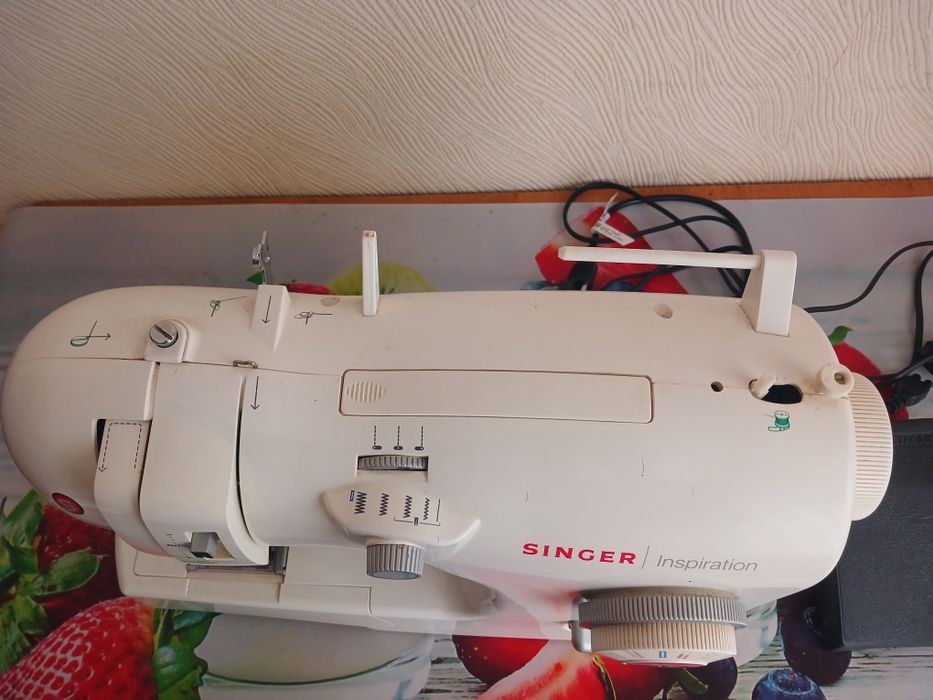 Продам  швейну машинку Singer