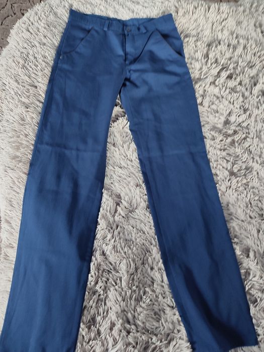 Брюки на хлопця шкільні