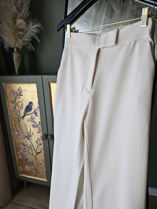 Eleganckie kremowe spodnie damskie H&M proste nogawki wysoki stan XS ś