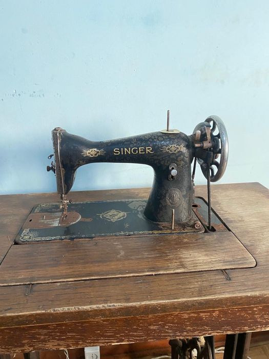 Máquina de pé Singer