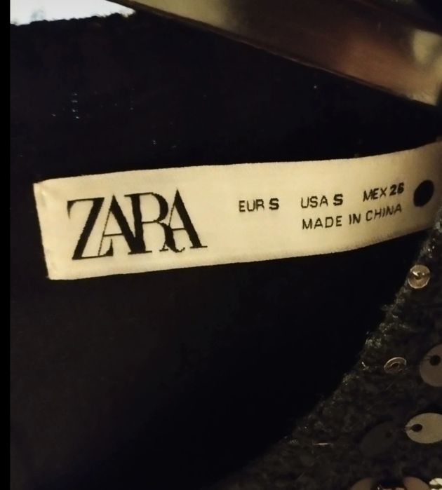 Vestido preto de lantejoulas