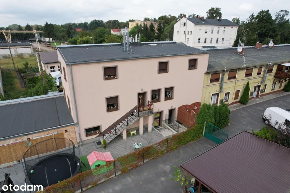Dom • 3 mieszkania • lokal usługowo - handlowy • garaż