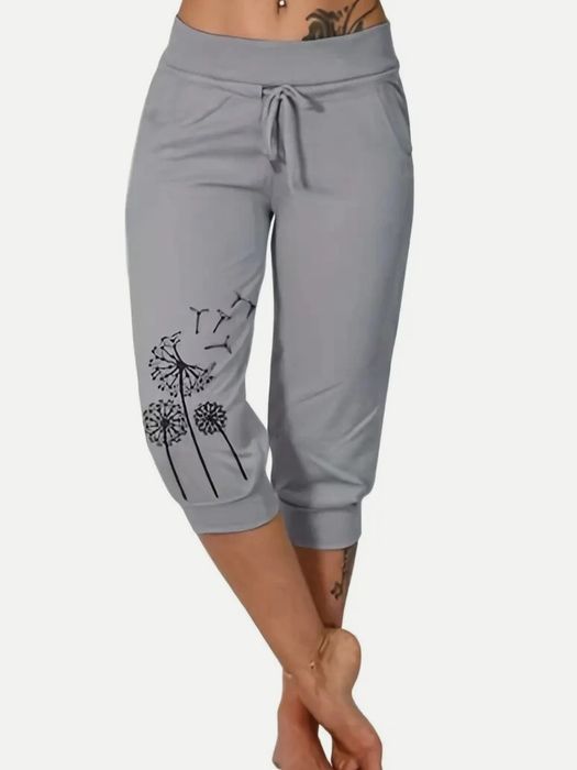 Spodnie damskie capri (rybaczki) nadrukiem mniszka lekarskiego rozm M