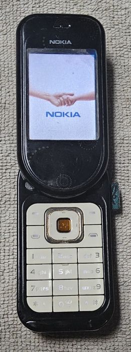 Мобильный телефон Nokia 7373,заряд,статуэтка,sharp,