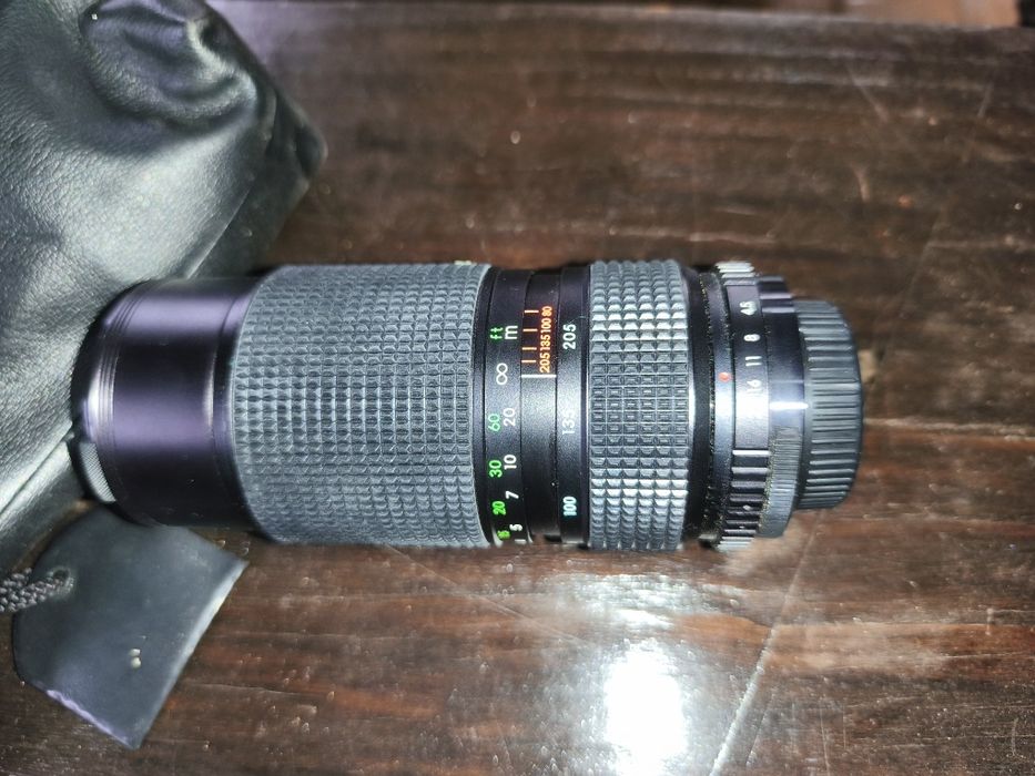 Objetiva máquina fotográfica
