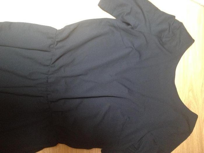 Macacão preto com costas abertas em V- Novo com etiqueta