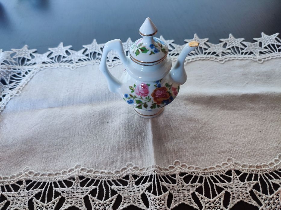 Conjunto peças decorativas em porcelana