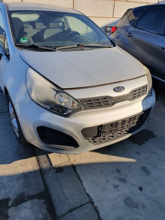 kia rio III maska