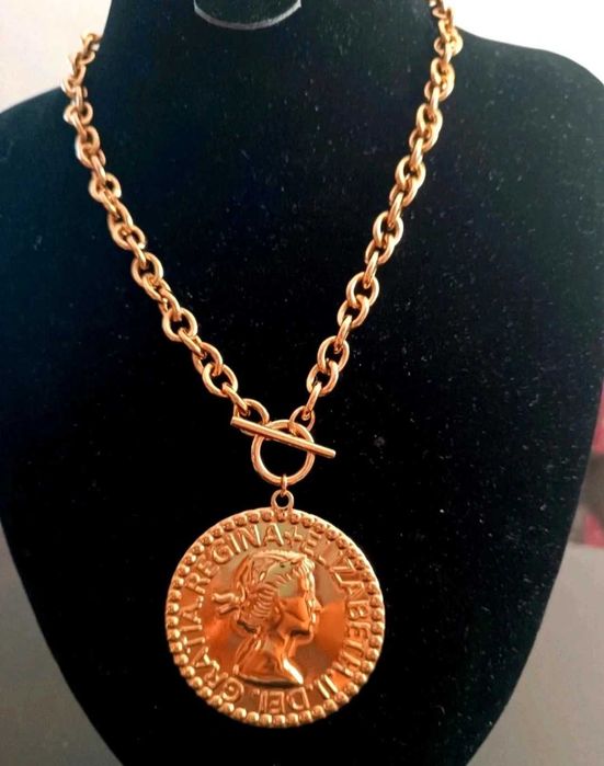 Colar da medalha grande.