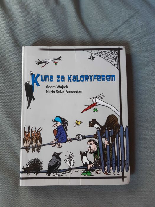 Kuna za kaloryferem, Adam Wajrak, Nuria Selva Fernandez