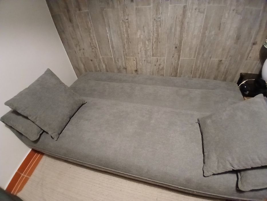 Sofá-cama cinzento