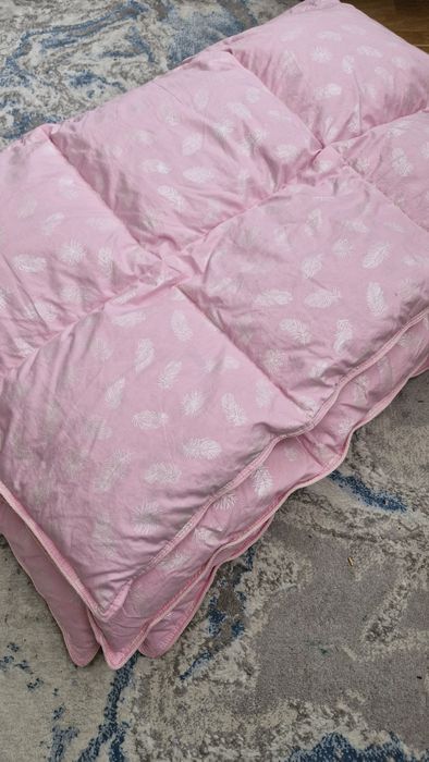 Новенька пір'яна ковдра-перина