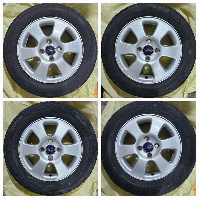Oryginalne alufelgi 4x108 ford z letnimi oponami 6mm, opel, peguot