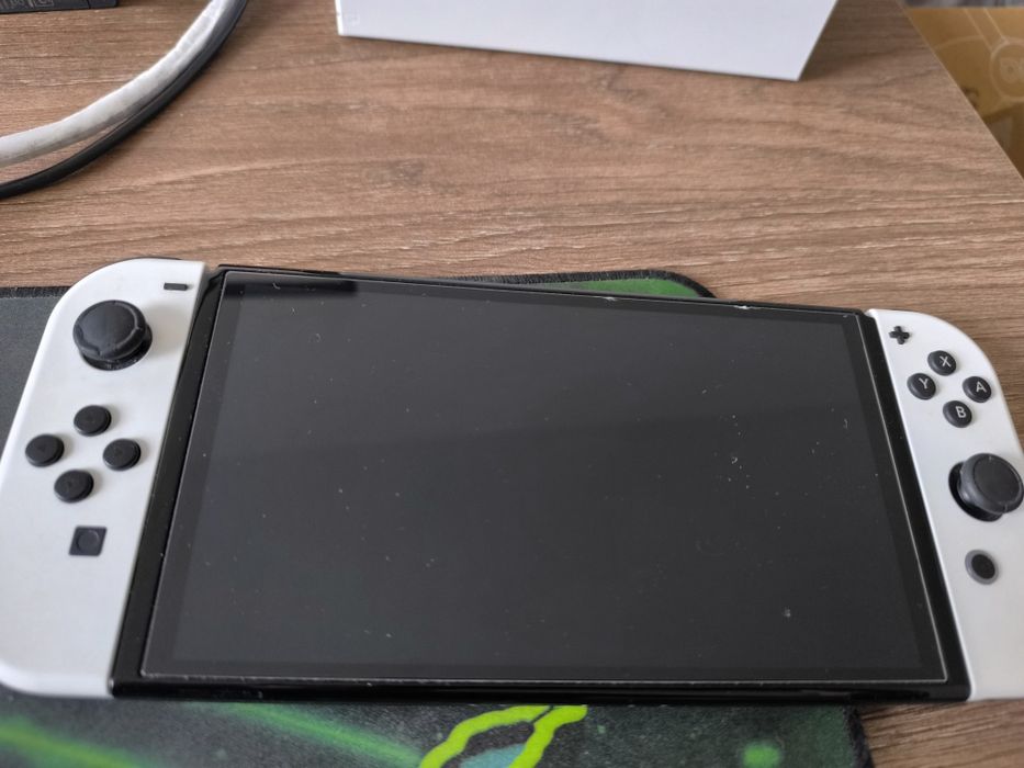 Nintendo Switch 1 OLED + dock + etui + adapter na joypady