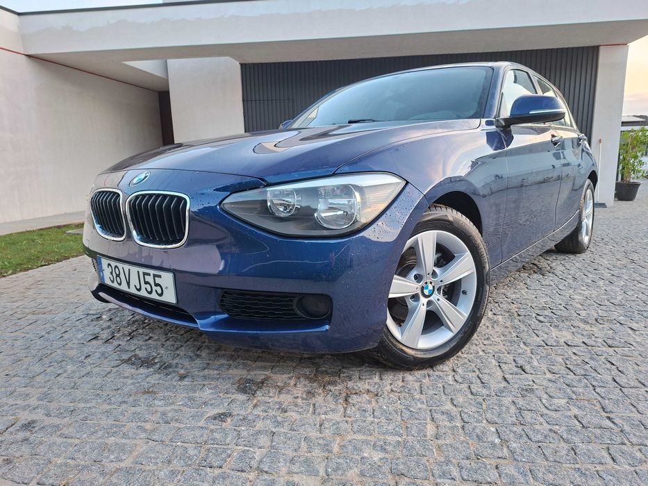 Bmw 116D com estofos em pele