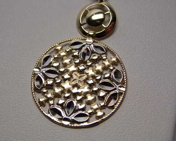 Złota dwukolorowa zawieszka ruchome elementy.