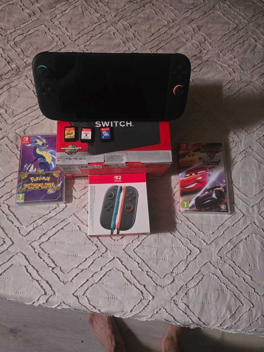 Estou a vender a minha nitendo sw 2 com mais 2 joy cons e 5 jogos