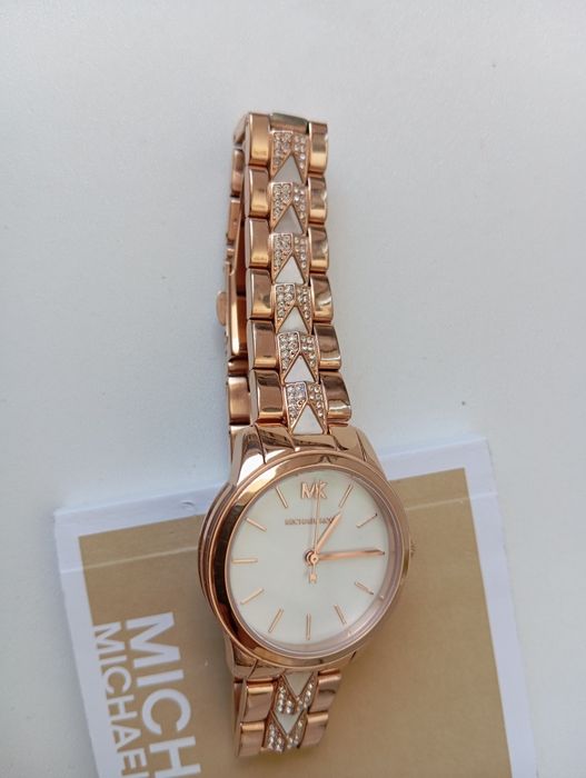 Nowy damski zegarek Michael Kors model 6674
Różowe złoto