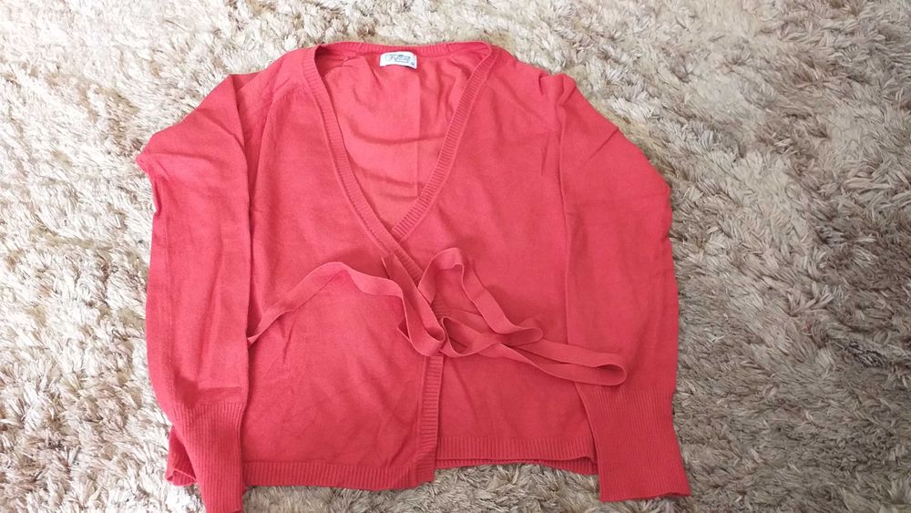 casaco de malha laranja