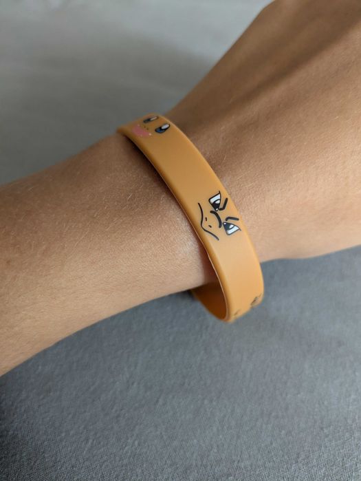 Pulseiras Charizard e Uchiha