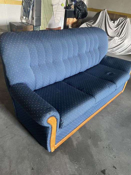 Sofá cama com três lugares