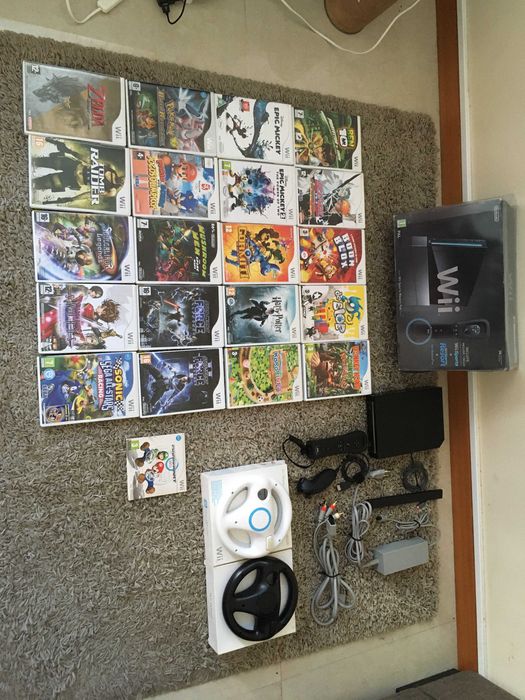 2 Wii Consoles + 2 Steering Wheels + 21 Games64564135964545121
