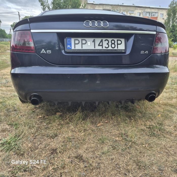 Обміняю ауді а6с6 2.4 бенз/газ 2005р.