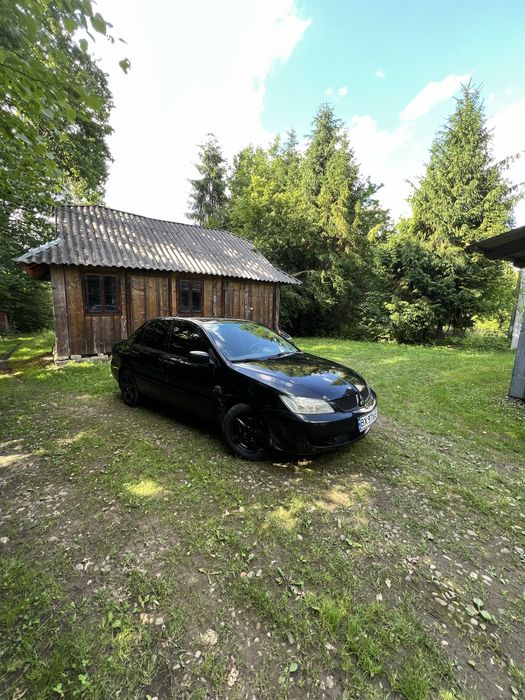 Продам Lancer  9