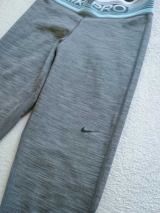 Damskie legginsy treningowe Nike PRO CJ3713.068 - rozmiar S, szare