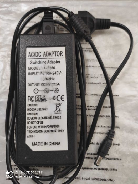 Блок питания адаптер для ноутбука 14V 5A.