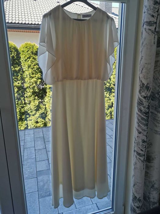 Sprzedam elegancką zwiewną sukienkę, rozmiar 38