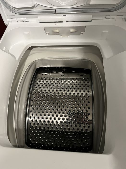 Вертикальна пральна машина AEG 7000 Series 1-7 кг