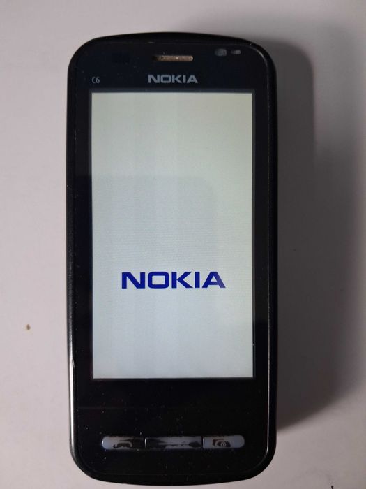 Telefon komórkowy NOKIA C6-00 sprawny.