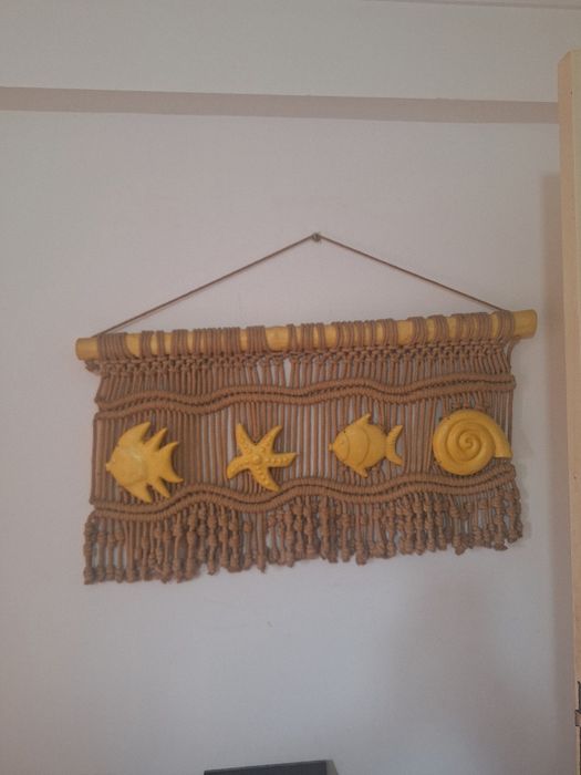 Painel de parede com alusão a peixes