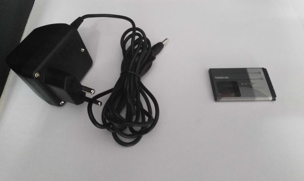 Bateria e carregador Telemóvel Nokia 1100 Originais.