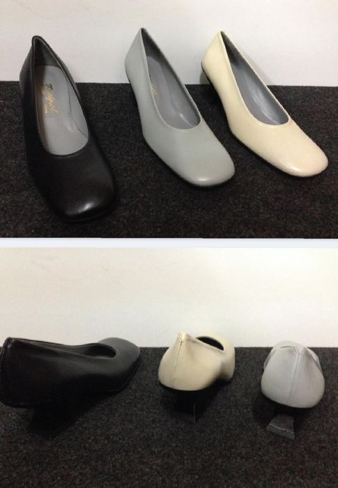 Sapatos/botas novos em pele