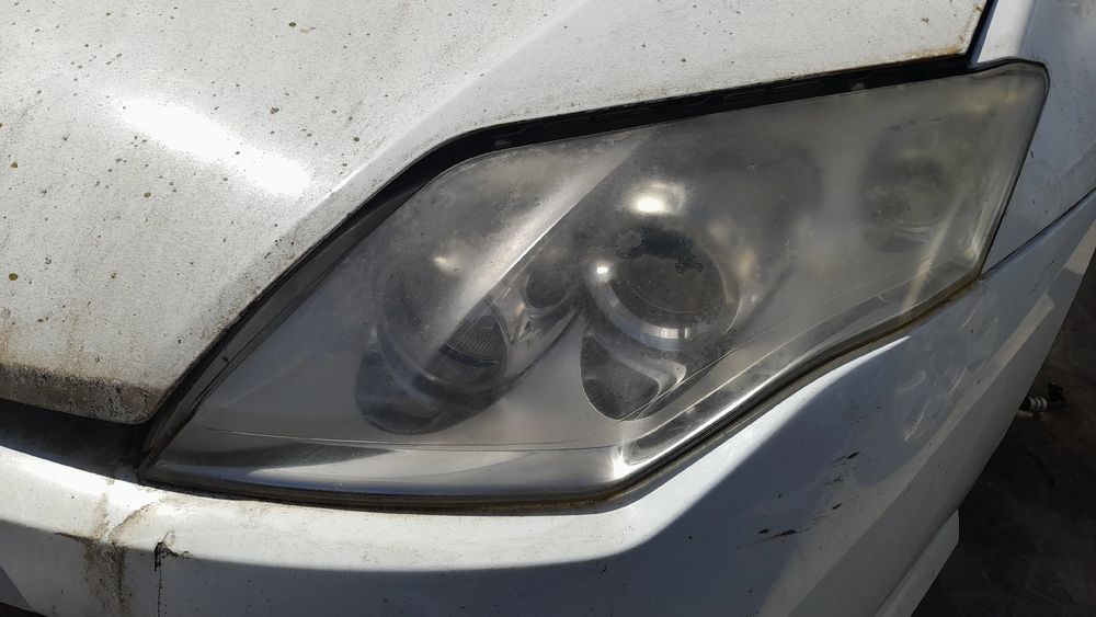 Ótica / farol esquerda RENAULT Laguna III (BT0/1)