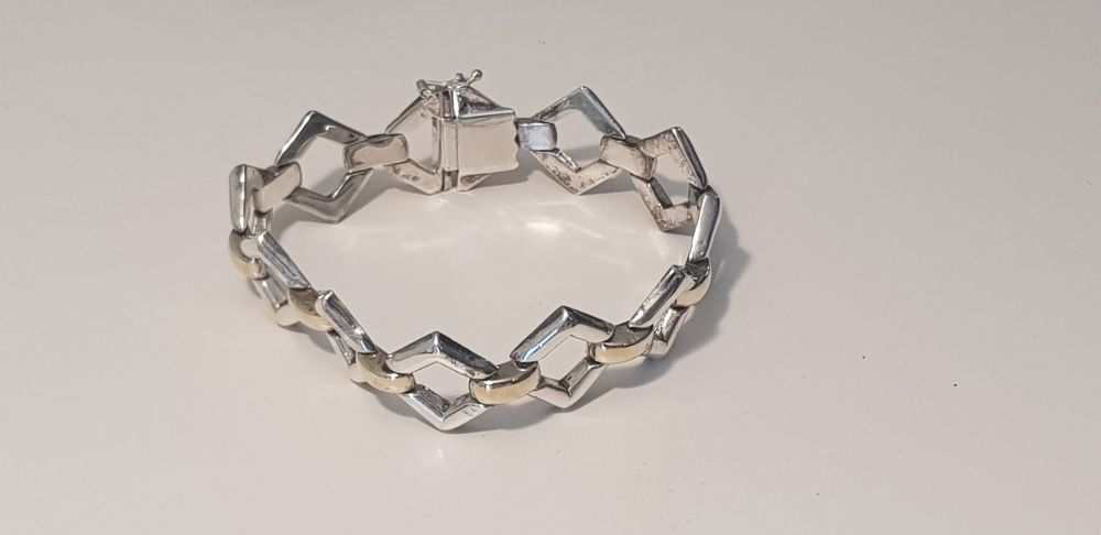 Pulseira semi rígida Prata e Ouro