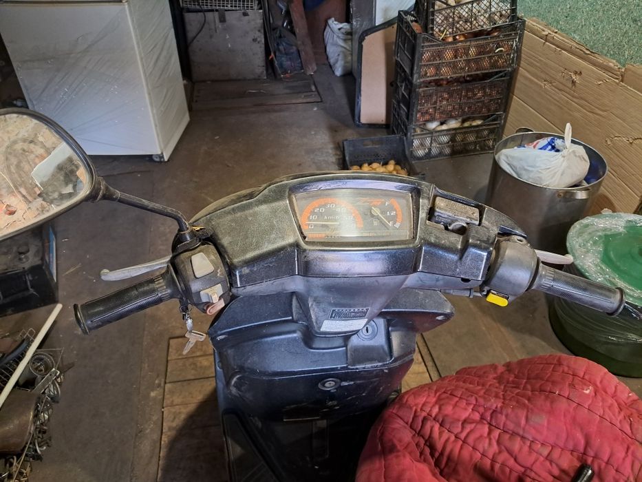 Скутер  Ямаха Аксис